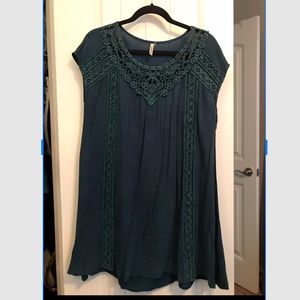 Faded green dress with lace design